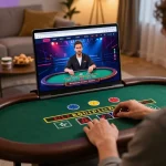Topclub player strategically betting at a live dealer blackjack table on a laptop.