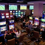 Vmax sports betting excitement in a bustling casino lounge where patrons place strategic bets.