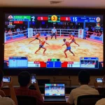 Engaging view of trực tiếp đá gà tournament showcasing live fighting matches, vibrant ambiance with enthusiastic viewers.